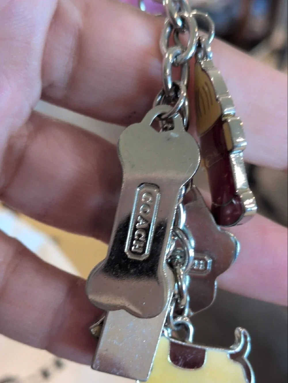 Coach Pet Charm Keychain in Silver, Gold, Red & Black